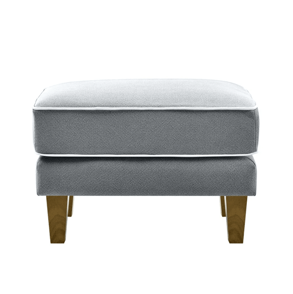 Bondi ottoman in grey fabric with white piping and wooden tapered legs front view
