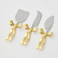 Bowtiful Cheese Knives Set of 3 with stainless steel blades and gold bow handles, designed for elegant cheese serving and entertaining.