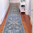Bridgeport Blue Runner styled in a light Hamptons hallway on warm timber flooring with a white console table.