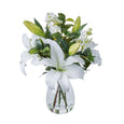 White Casablanca lily artificial arrangement in clear glass Nara vase with greenery