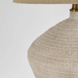 Caufield table lamp creating warm ambient lighting in Hamptons style living room