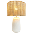 Coastal bedside styling featuring Cayman ceramic and rattan table lamp