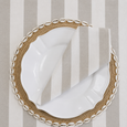 Chambray Natural Stripe tablecloth and matching napkin styled with shell placemat and white ceramic dinner plate for coastal dining table styling