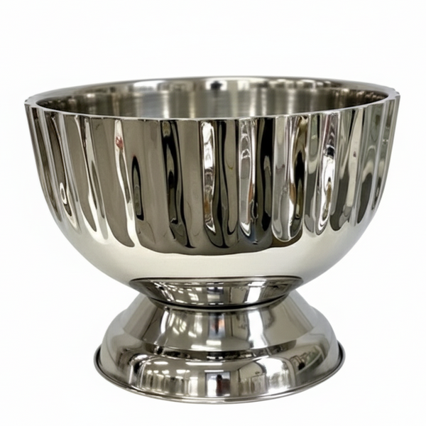 Polished stainless steel footed champagne bucket with fluted detailing, filled with champagne bottles — elegant design for stylish entertaining.