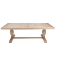 Charlotte 240cm dining table in natural oak with parquetry top, sculpted pedestal legs and trestle base.