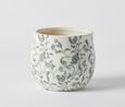 Grey and white porcelain planter pot with French-inspired floral chinoiserie pattern and crackle glaze finish