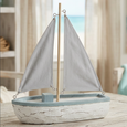 Coastal Breeze Sailing Boat Ornament styled on a timber table in a relaxed Hamptons-inspired living space.