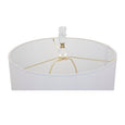 Coastal designer coral table lamp creating warm ambient lighting in an elegant living room
