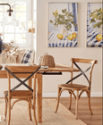 Coastal Hamptons interior styled with lemon still life canvas wall art adding warmth and colour
