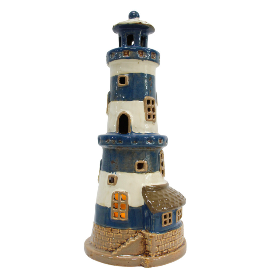 Coastal Lighthouse Tealight Holder 25cm in navy blue and creamy white with nautical stripes and cut-out windows.