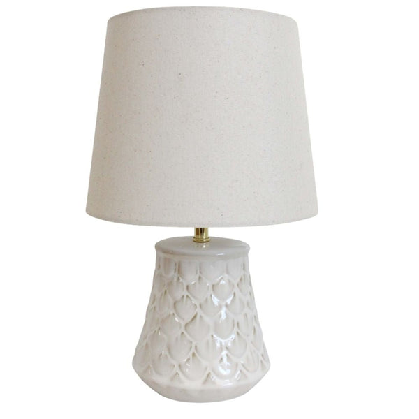 Coastal Pearl ceramic table lamp with soft fabric shade styled in a coastal bedroom interior