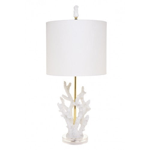 Luxury coral table lamp with gold stem, acrylic base and white linen drum shade styled in a coastal-luxe interior
