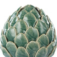 Top view of large green ceramic artichoke sculpture with glossy layered leaves