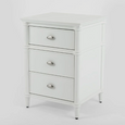 Dakota 3 Drawer White Bedside Table shown from an angled view with silver-toned handles and rounded corner detailing.