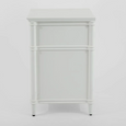 Side view of the Dakota Bedside Table 3 Drawer White showing its slim profile, moulded detailing and raised legs.