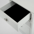 Close-up of the Dakota Bedside Table White showing the open drawer interior and silver-toned oval handle.