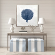 Natural Coral XII Indigo Designer Boys framed coastal artwork styled above a console in an elegant blue and white Hamptons interior.