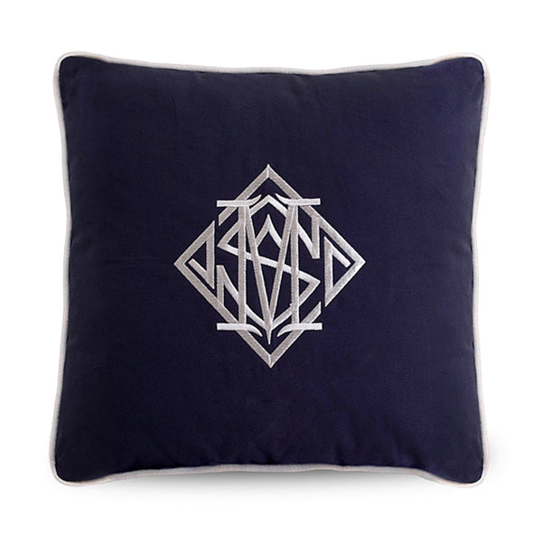 navy cushion cover with white embroidered diamond monogram and piped edge, classic coastal styling
