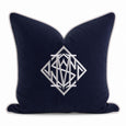 navy cushion cover with white embroidered diamond monogram and piped edge, classic coastal styling