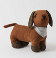 Brown corduroy dog-shaped door stop with herringbone paws and ears, featuring a grey scarf and weighted design for holding doors open.