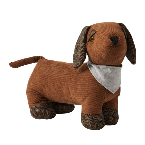 Brown corduroy dog-shaped door stop with herringbone paws and ears, featuring a grey scarf and weighted design for holding doors open.