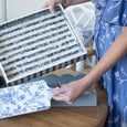 Sage scalloped tray styled on timber table with coastal servingware and Hamptons décor