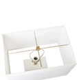 Premium brass base and matching finial detail on the Dominique table lamp.