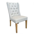 Eastport Dining Chair in neutral linen blend with deep buttoned back and stained oak legs
