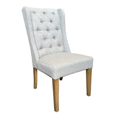 Eastport Dining Chair in neutral linen blend with deep buttoned back and stained oak legs