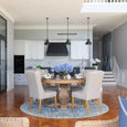 Eastport Dining Chairs styled around a round timber table in a Hamptons dining room
