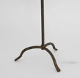 Elegant rustic table lamp with bronze iron base and natural linen shade on console table
