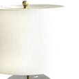 Ellyn Glass and Brass Table Lamp placed on a bedside table, creating a warm and elegant bedroom ambience.