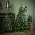 Emerald Cashmere Pine Tree 180cm with lush green branches and frosted cashmere finish on a sturdy iron stand