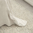 Veil Blue Rug with soft duck egg pattern styled beside white bedding