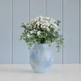 Eucalypt and Baby’s Breath Faux Floral Bunch styled in a soft blue decorative vase against a Hamptons-inspired backdrop.
