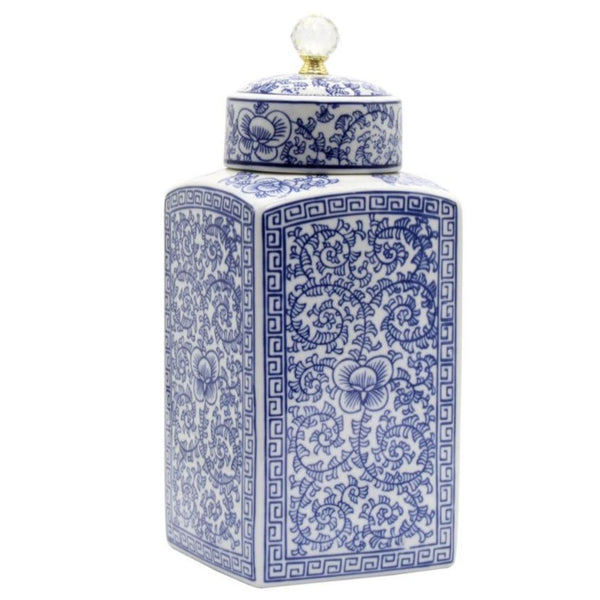 Blue and white floral ceramic canister with decorative lid and crystal-look finial, inspired by classic chinoiserie styling.