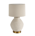 Forbes white sandstone table lamp with linen shade on a bedside table in a coastal style interior

