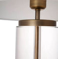 Close-up of the Forrester table lamp showcasing solid crystal construction and polished brass accents.
