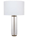 Forrester crystal table lamp featuring a solid clear crystal column, brass detailing and white linen shade.