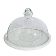 Glass cloche with white marble base on white background