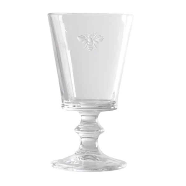 Clear glass wine goblet with embossed French bee detail and pedestal base