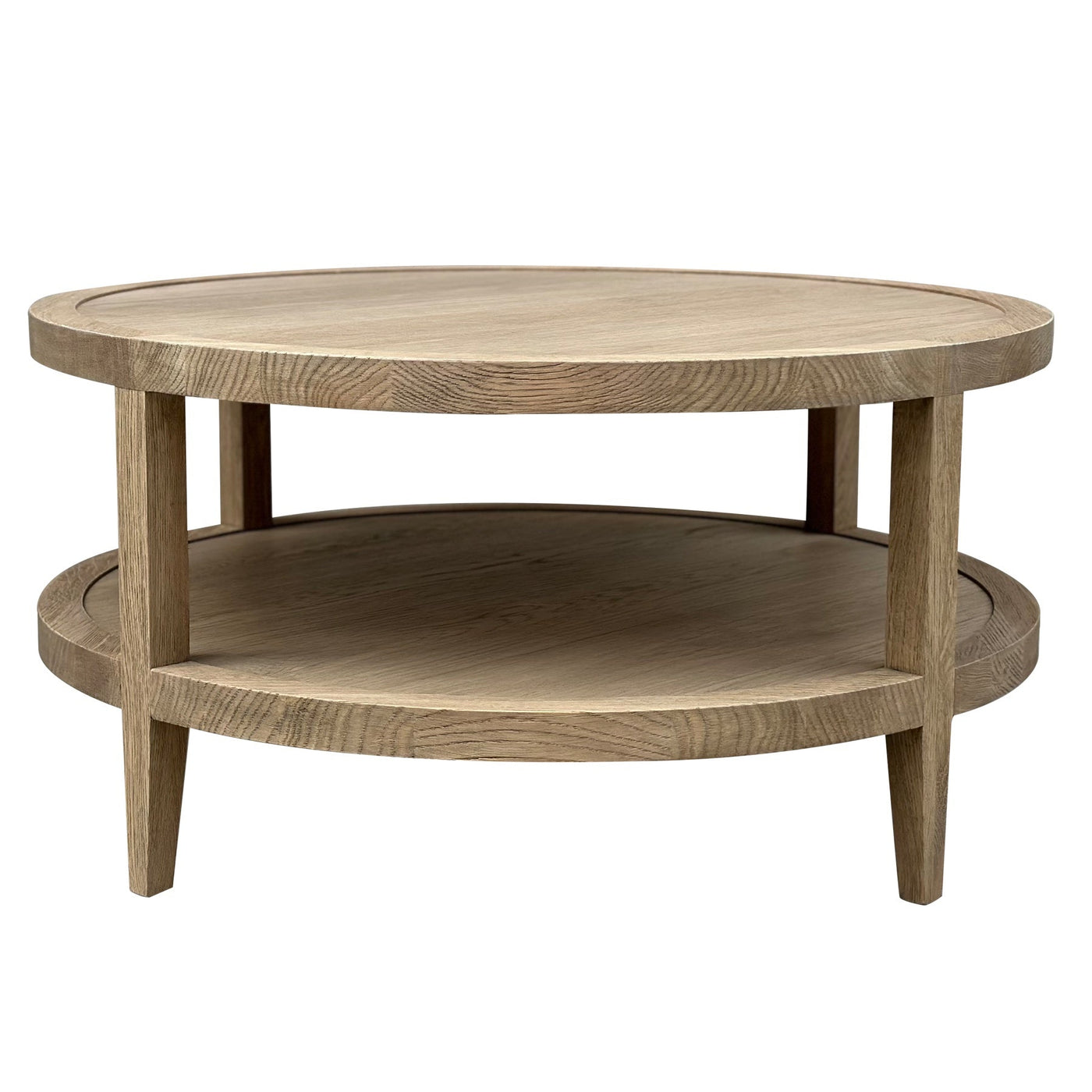 French Contemporary Round Coffee Table in weathered oak featuring a round solid oak top and practical lower storage shelf.