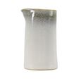 Side view of French Stoneware Creamer Jug 14cm showing its organic shape, pouring spout and reactive glaze finish.