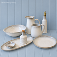 French Stoneware Oil & Vinegar Bottle styled with coordinating reactive glaze jugs, serving bowls and platters from the French Stoneware Range.