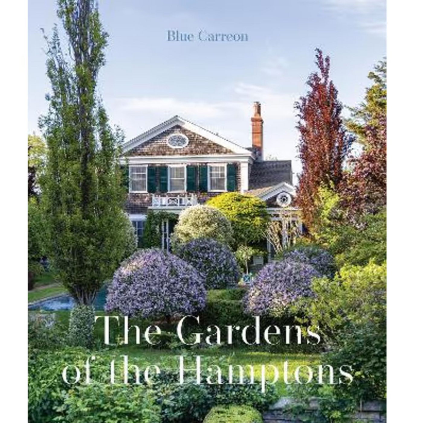 Gardens of the Hamptons hardcover coffee table book by Blue Carreon featuring a grand Hamptons home surrounded by lush landscaped gardens