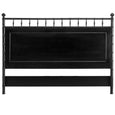 Grand Bahama King bedhead in black stain by Xavier Furniture with hand-carved faux bamboo detailing for a sophisticated coastal bedroom.