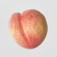 Artificial peach decorative fruit styled in Hamptons-inspired home interior