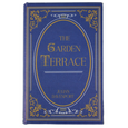 The Garden Terrace decorative book box featuring a rich navy cover, ornate gold borders and vintage-inspired typography.