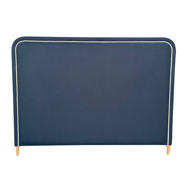 Navy linen king bedhead with white piping and oak legs front view