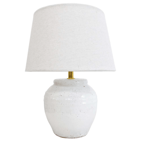Harbour White Medium Lamp with white terracotta base and linen shade styled in a Hamptons interior
